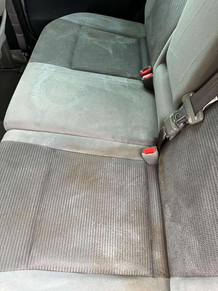 Gray rear seat before cleaning