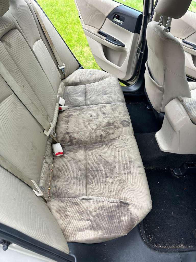 Dirty rear seats before detailing